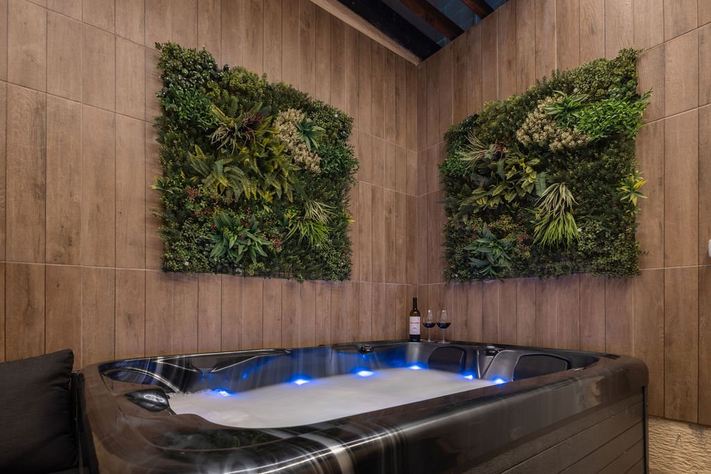 Private two-person hot tub with blue lighting at The Retreat in Gozo